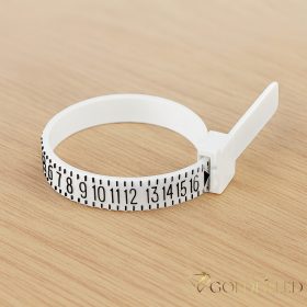   Nástroj na meranie veľkosti prsteňa (Ring sizer) Toto je nastaviteľný plastový merač prsteňa, pomocou ktorého je možné presne zmerať obvod prsta pri kúpe prsteňa.